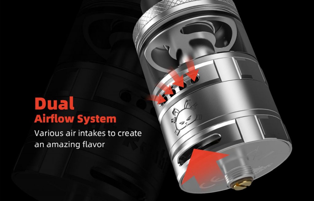 Close of up the Hellvape Fat Rabbit RTA UK Airflow with arrows showing how its dual airflow system works. Arrows indicating four small airflow vents in the middle of the RTA and one arrow indicating the larger airflow holt at the base of the RTA. Text reads "Dual Airflow System. Various air intakes to create an amazing flavour."