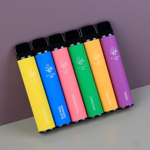 Six Elf Bar Disposable Vapes in different flavours lined up against a purple background