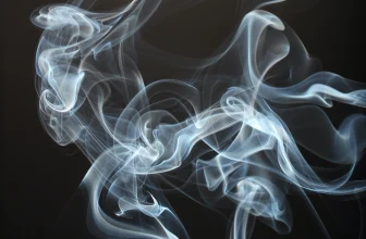 swirls of vapour on a black background
