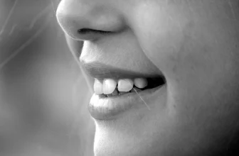 A person's smiling mouth