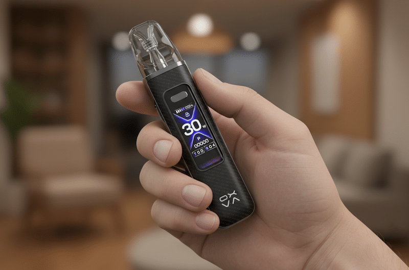 A hand holds up an Oxva Xlim Pro 3